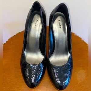 Ladies size 5.5 black patterned 4” high heels.